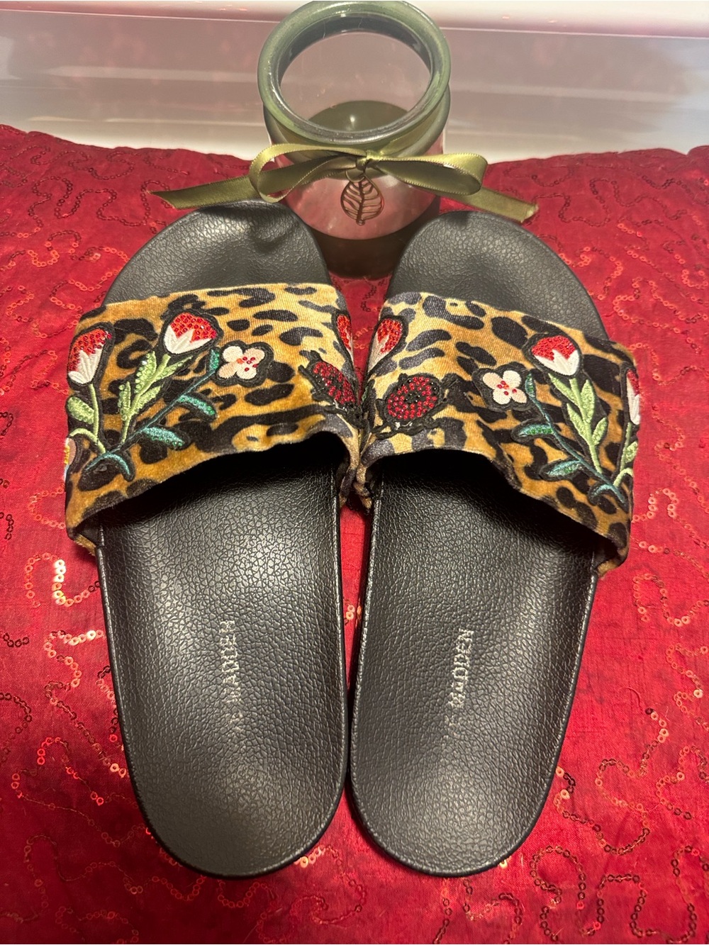 Like new STEVE MADDEN faux animal fur with embroidered floral design slides.